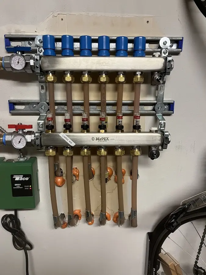 Plumber performing Leak Detection at a residential property in Lowell